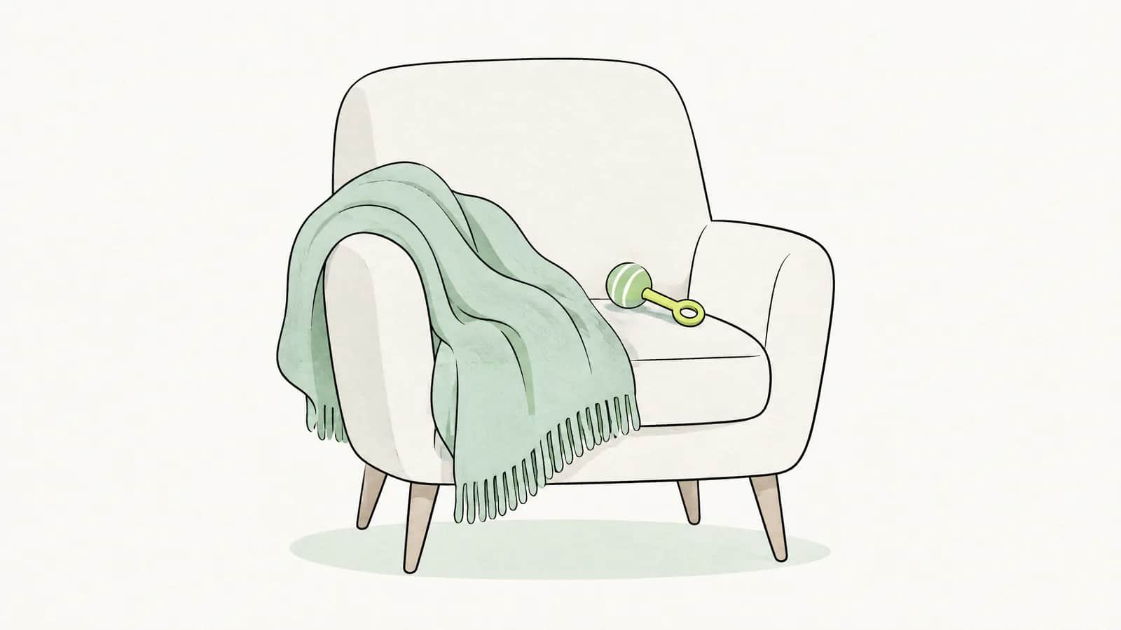Illustration: weiche Decke und kleine Rassel auf einem ruhigen Sessel