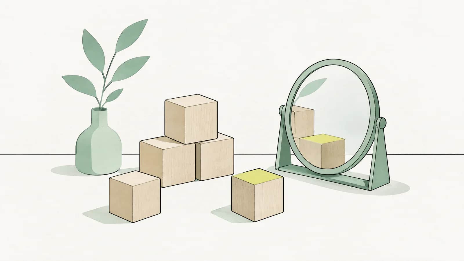 Illustration: Holzklötze ohne Buchstaben und ein kleiner Handspiegel auf einem Tisch